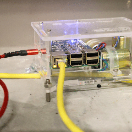 Seismometer is a clear box with wires running out of it
