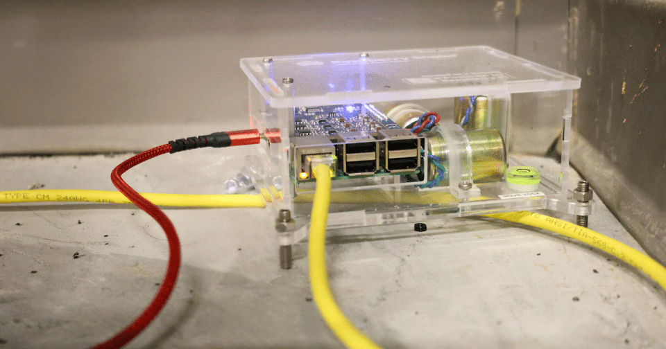 3 Seismometer is a clear box with wires running out of it