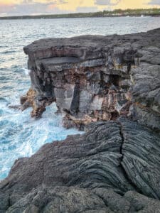 rocky cliff by ocean