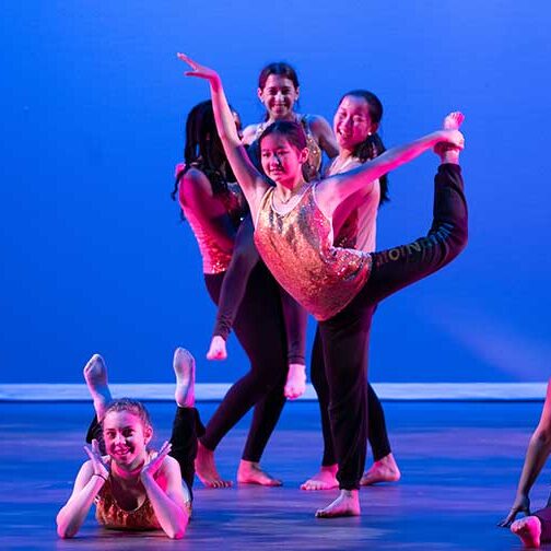 young girls dancing on stage