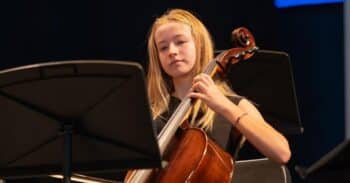 Student plays a cello.